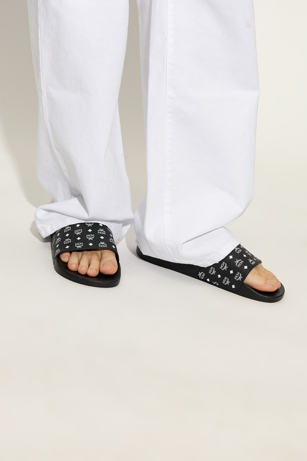 Black and store white mcm slides